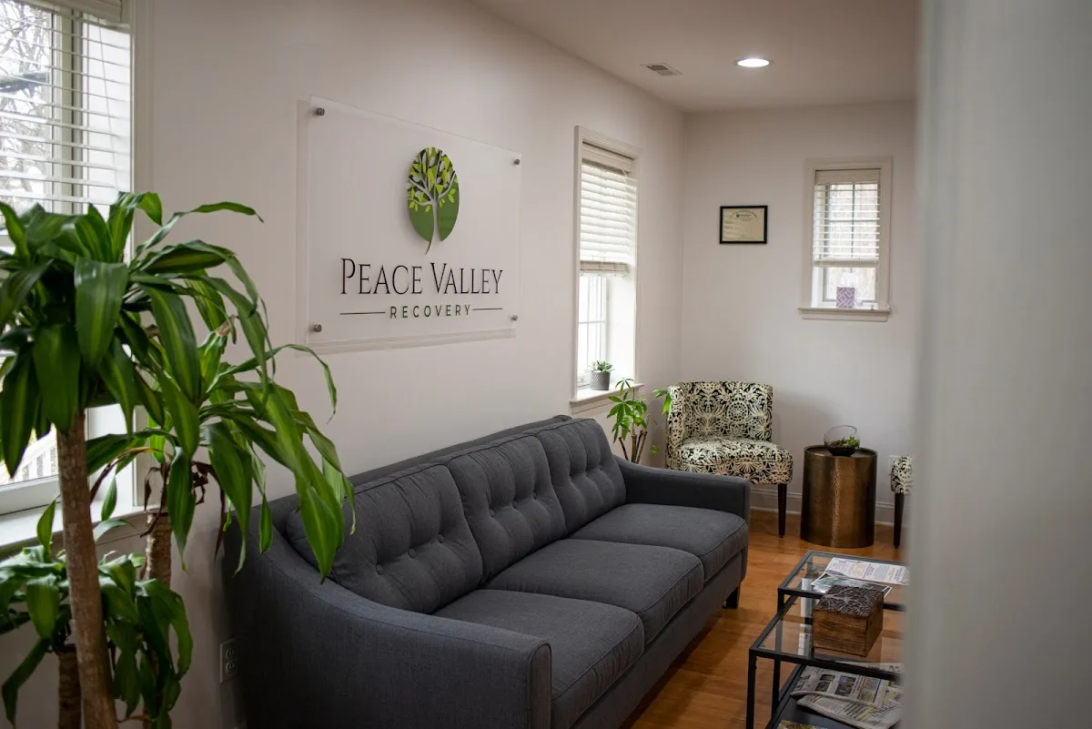 Cozy waiting area with plants at Peace Valley Recovery, a detox center in Philadelphia.