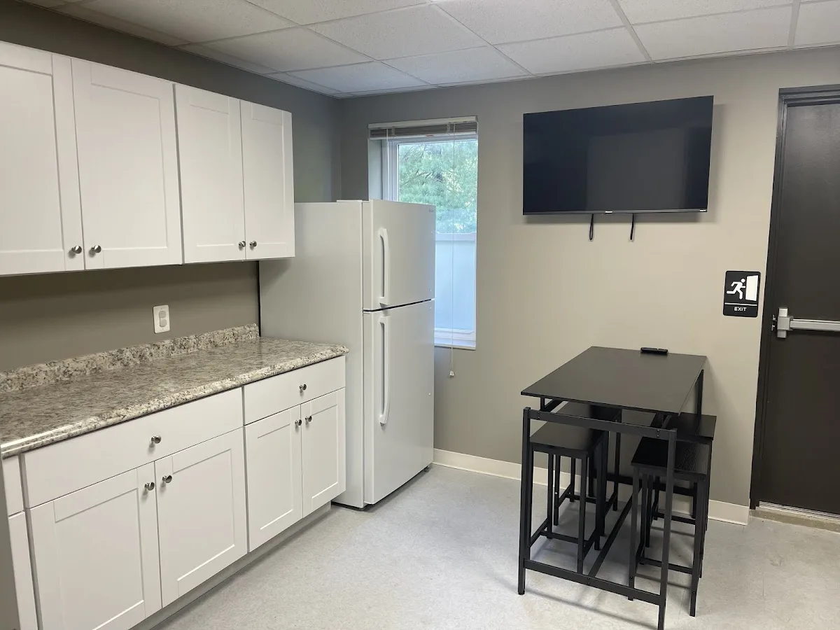 Modern kitchen with dining area at MPower Wellness of Exton, a detox center in Philadelphia.